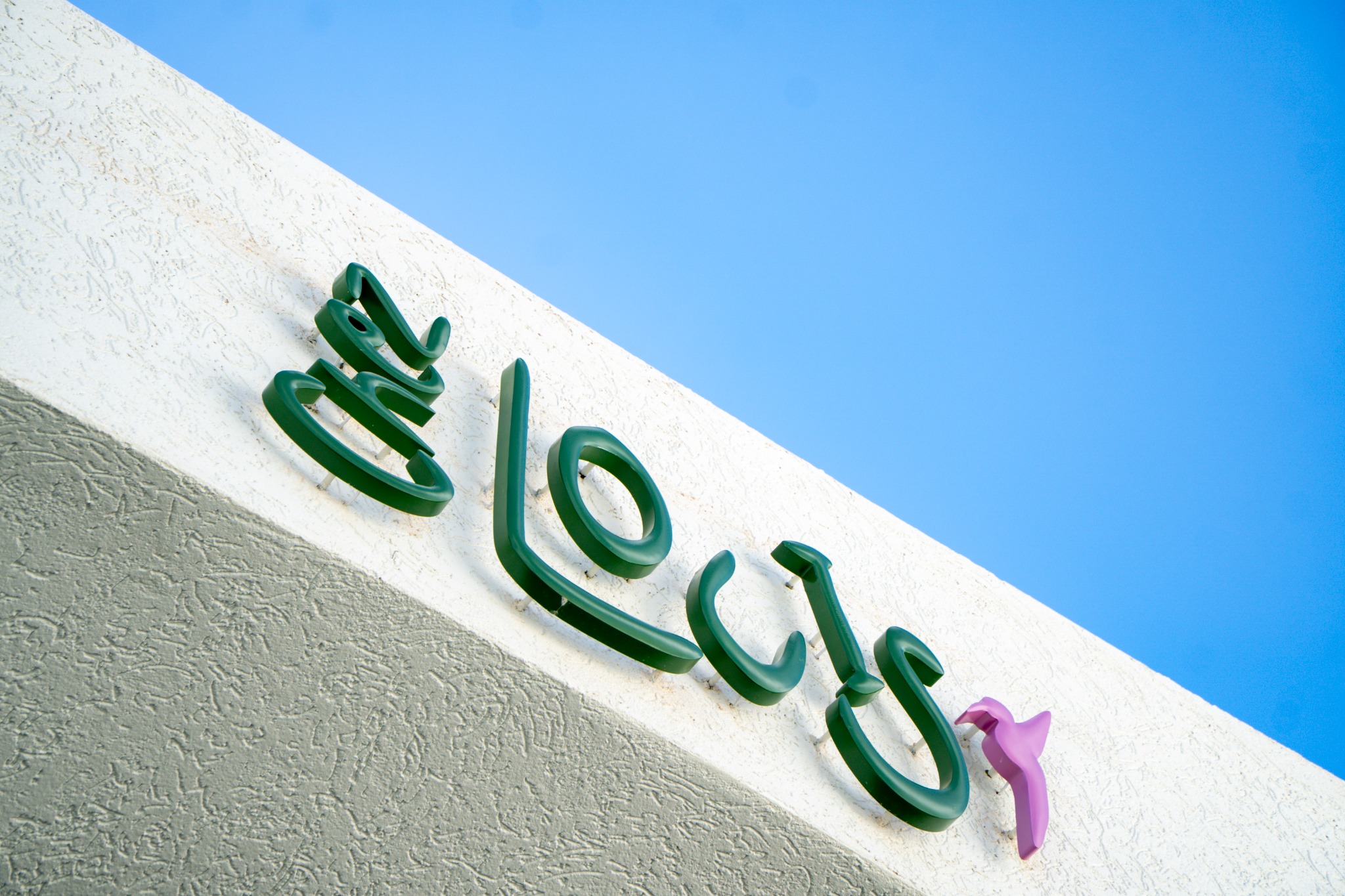 Close-up of exterior business signage